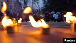 Огни, зажженные в Буче в первую годовщину освобождения города от российских войск (фото 31 марта 2023 г.)